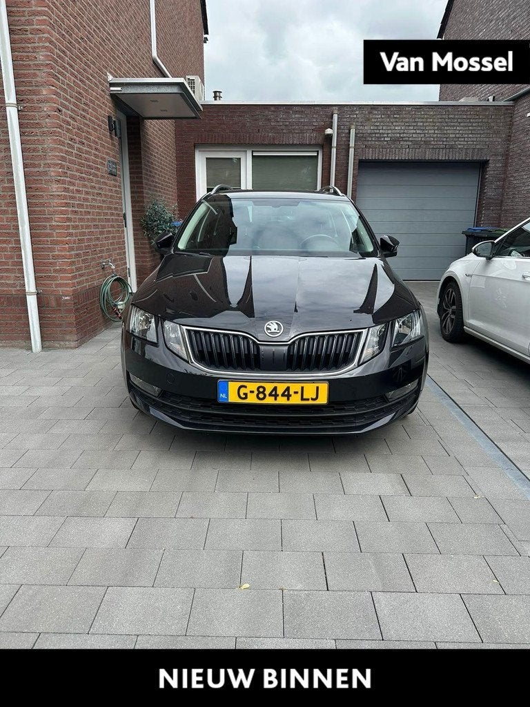 Skoda Octavia Combi 1.0 TSI Greentech Clever Edition, Auto's, 12 maanden, Gebruikt, Zwart, Origineel Nederlands