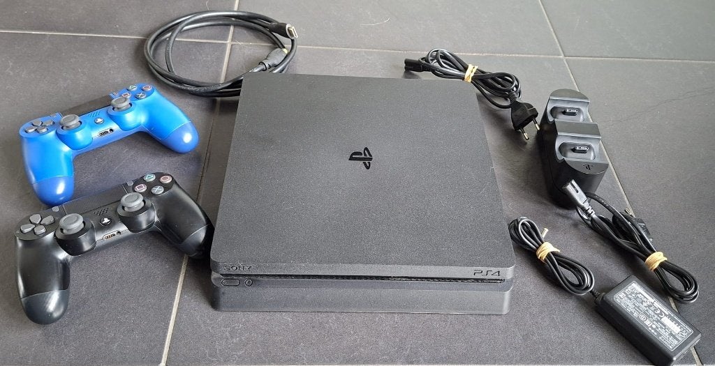 PlayStation 4 Slim Set Incl. 2 Controllers & 10 games!, Met 2 controllers, Ophalen of Verzenden, Zo goed als nieuw, Slim