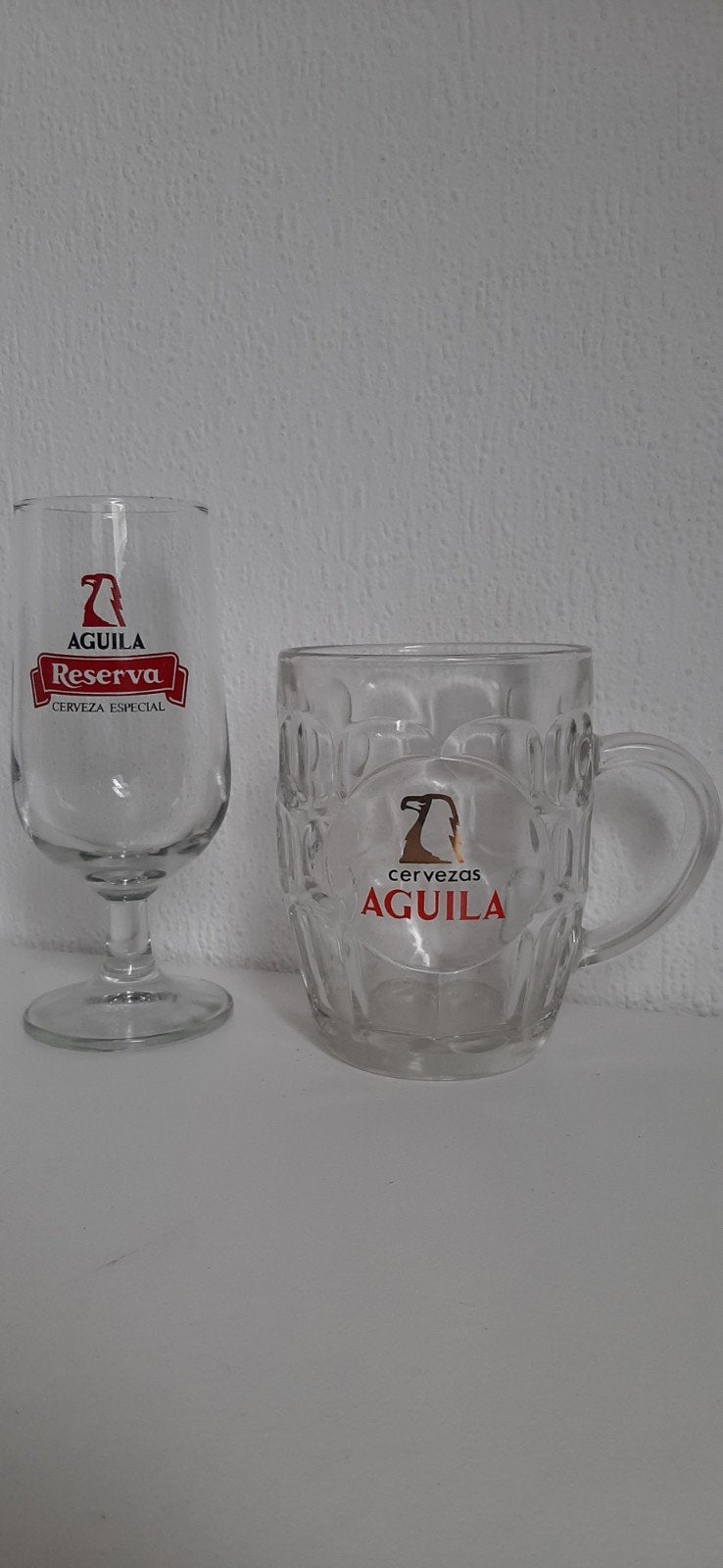 Aguila Reserva Bierglazen Set - Voetglas en Pul, Ophalen of Verzenden, Zo goed als nieuw, Bierglas