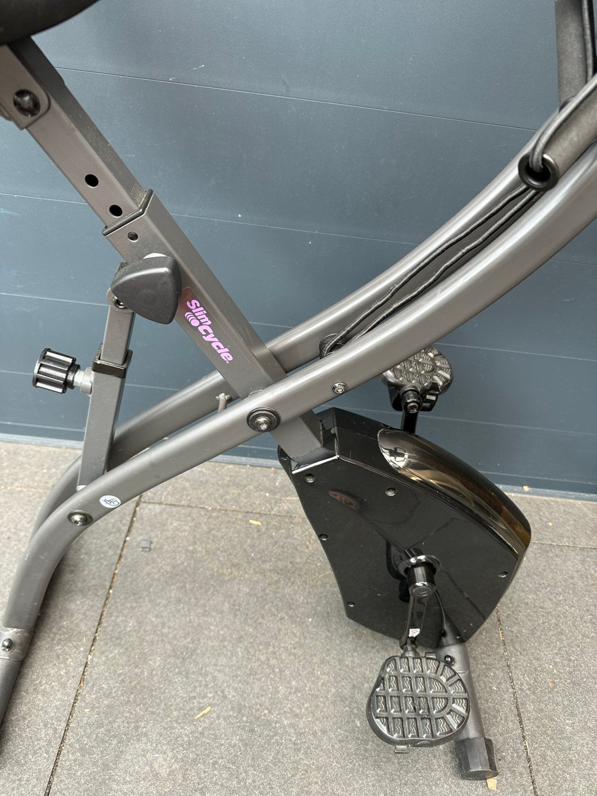 Vouwbare hometrainer / fitnessfiets - Slim Cycle, Ophalen, Gebruikt, Metaal, Benen