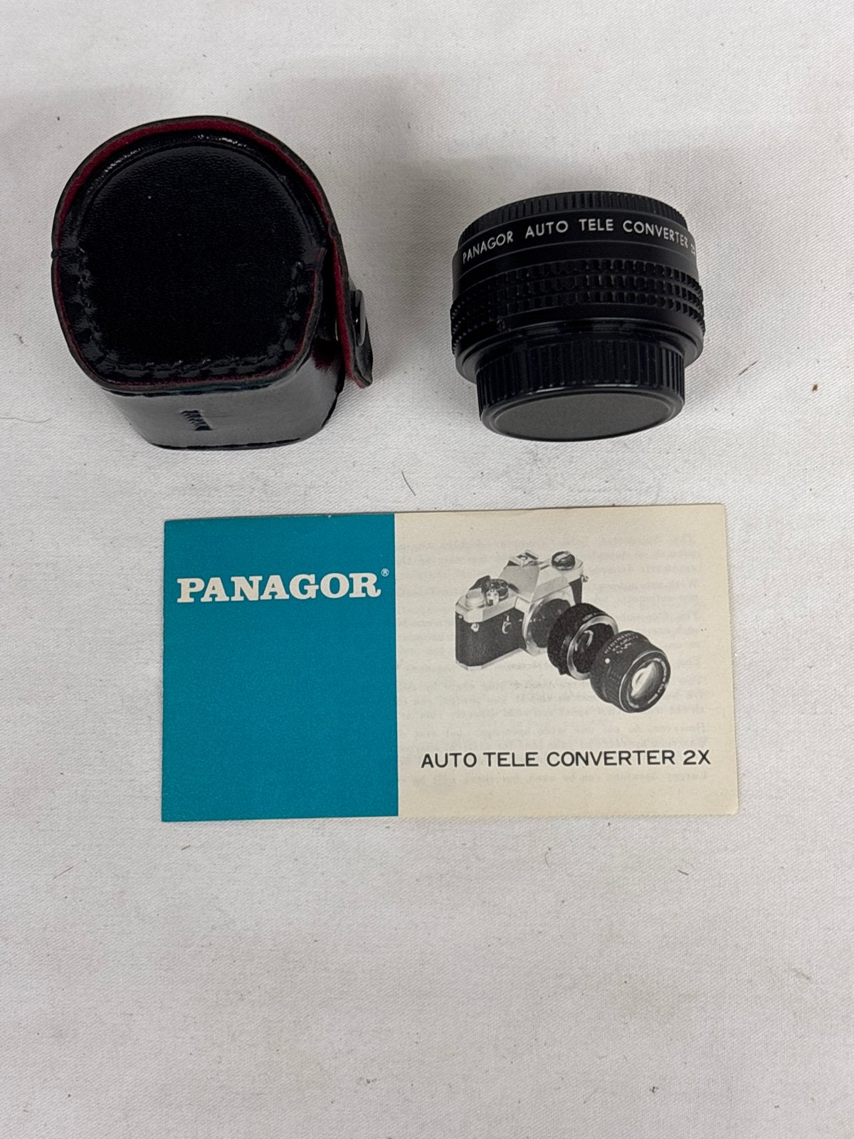 Panagor Auto Tele Converter 2x met hoesje, Overige merken, Gebruikt, Beschermhoes/tas, Ophalen of Verzenden