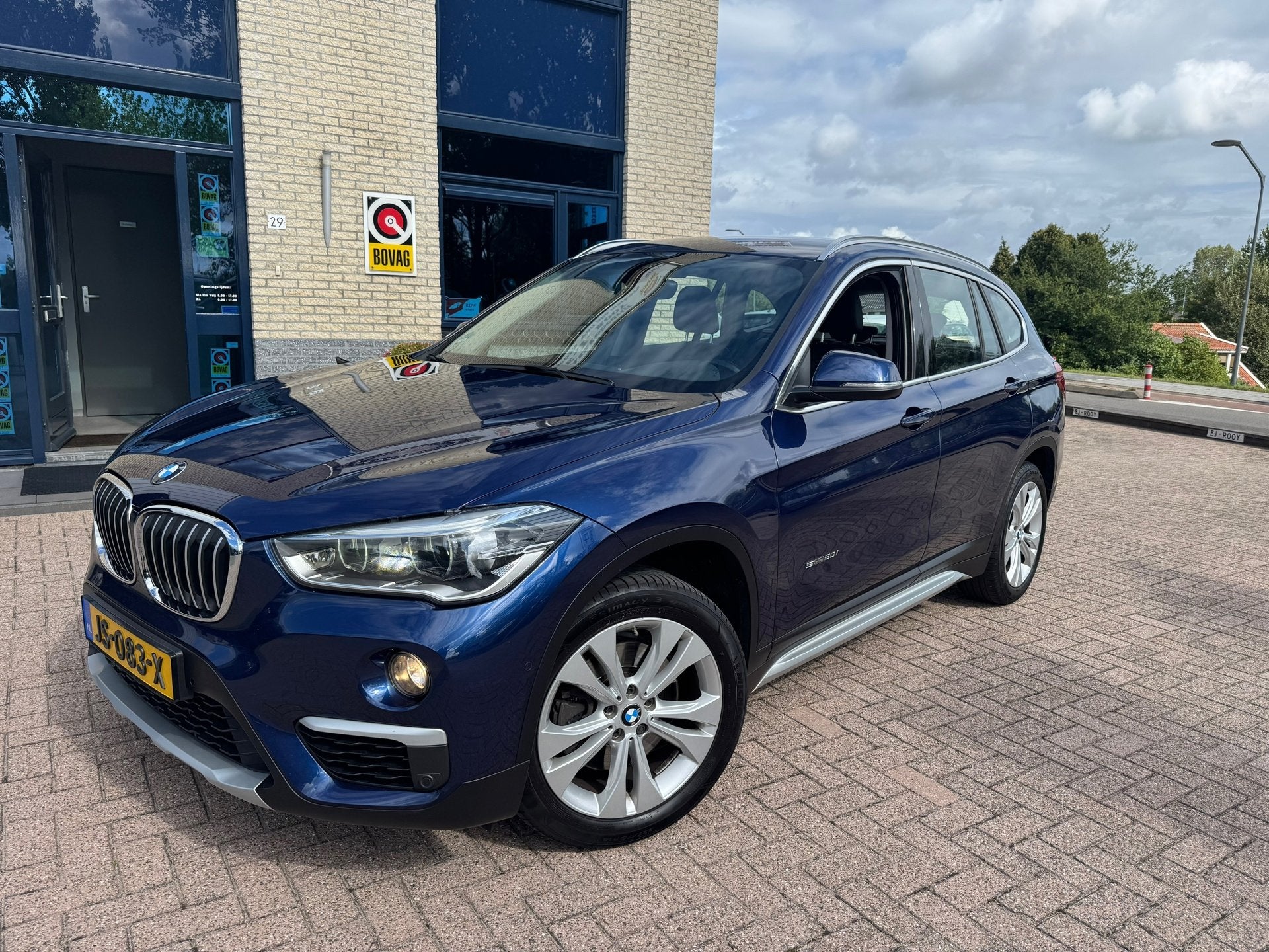 BMW X1 SDrive20i Centennial Executive- automaat- nl auto, Auto's, 1998 cc, Blauw, Leder en Stof, Origineel Nederlands