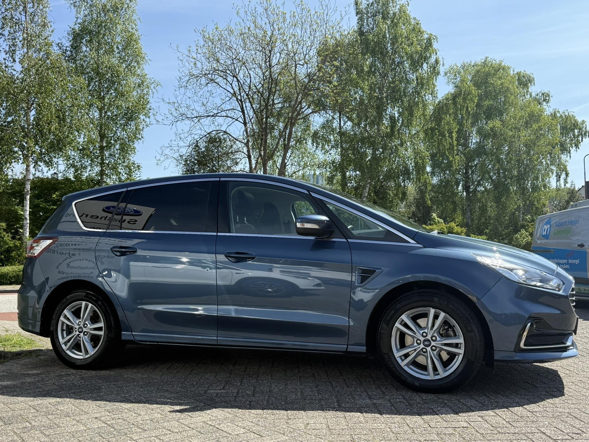 Ford S-Max 2.5 FHEV Titanium 7pers 190pk | Panoramadak | Ach, Auto's, Stof, Gebruikt, Blauw, 7 stoelen