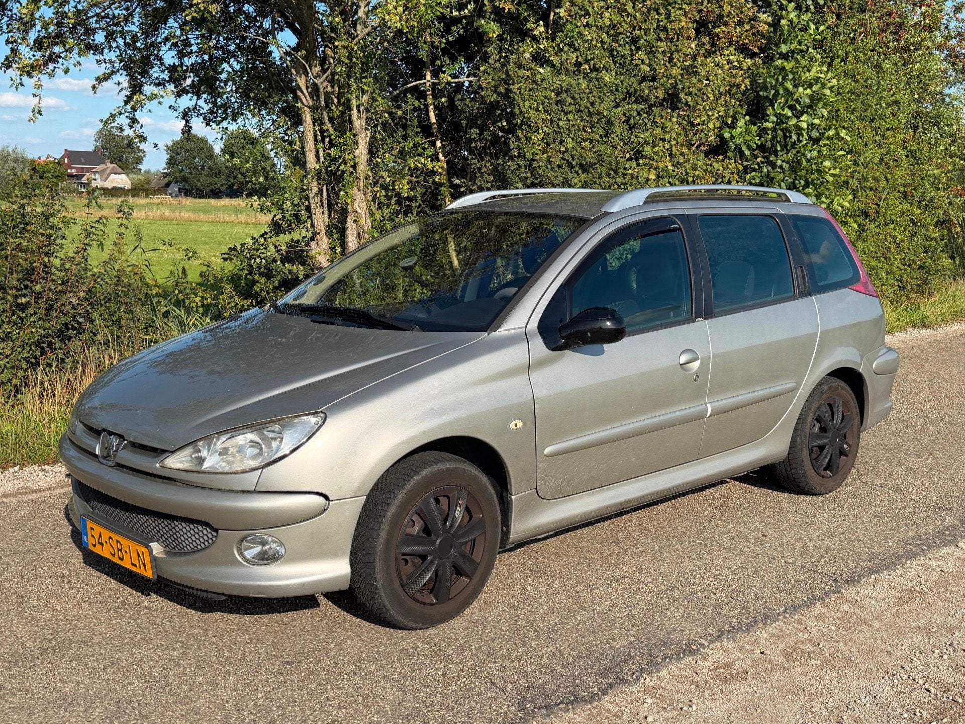 Peugeot 206 SW 1.6-16V Griffe APK 03-2027 NAP Leder NAP, Auto's, Peugeot, Voorwielaandrijving, 15 km/l, Gebruikt, Zwart