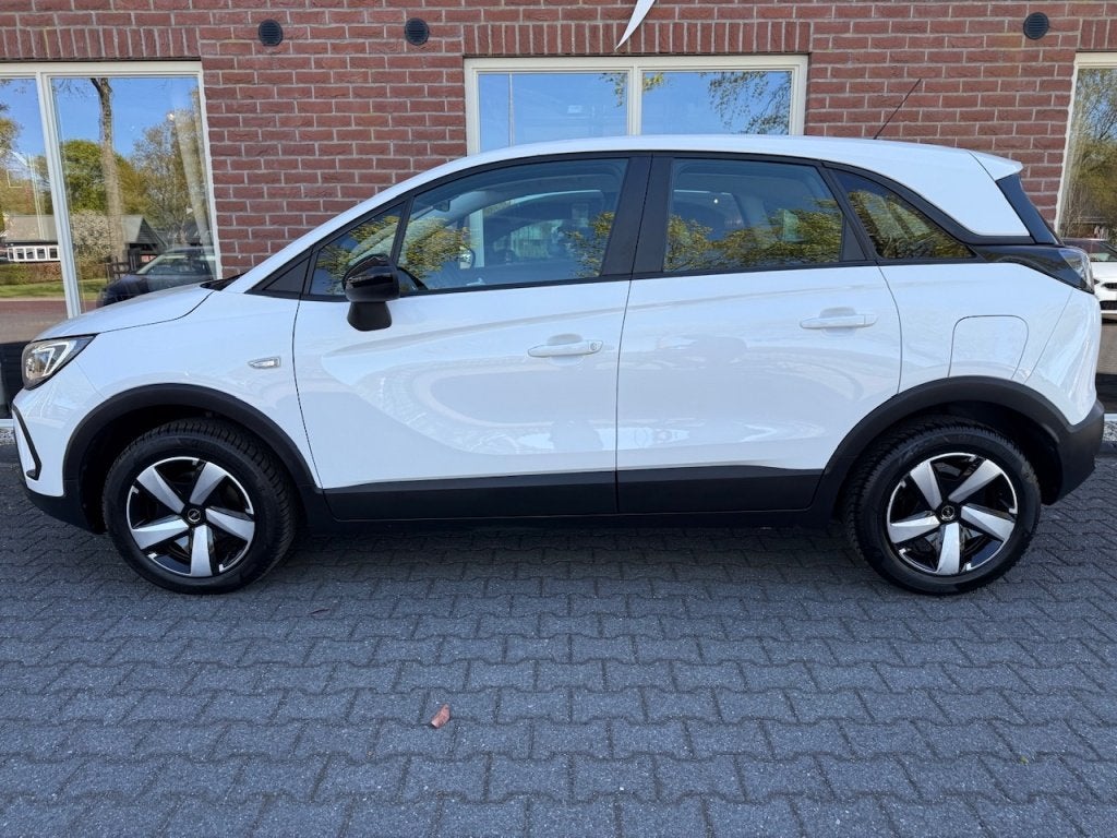 Opel Crossland 1.2 T. Bns Edition TREKHAAK / CAMERA / AIRCO, Auto's, 21 km/l, Gebruikt, 1199 cc, Wit