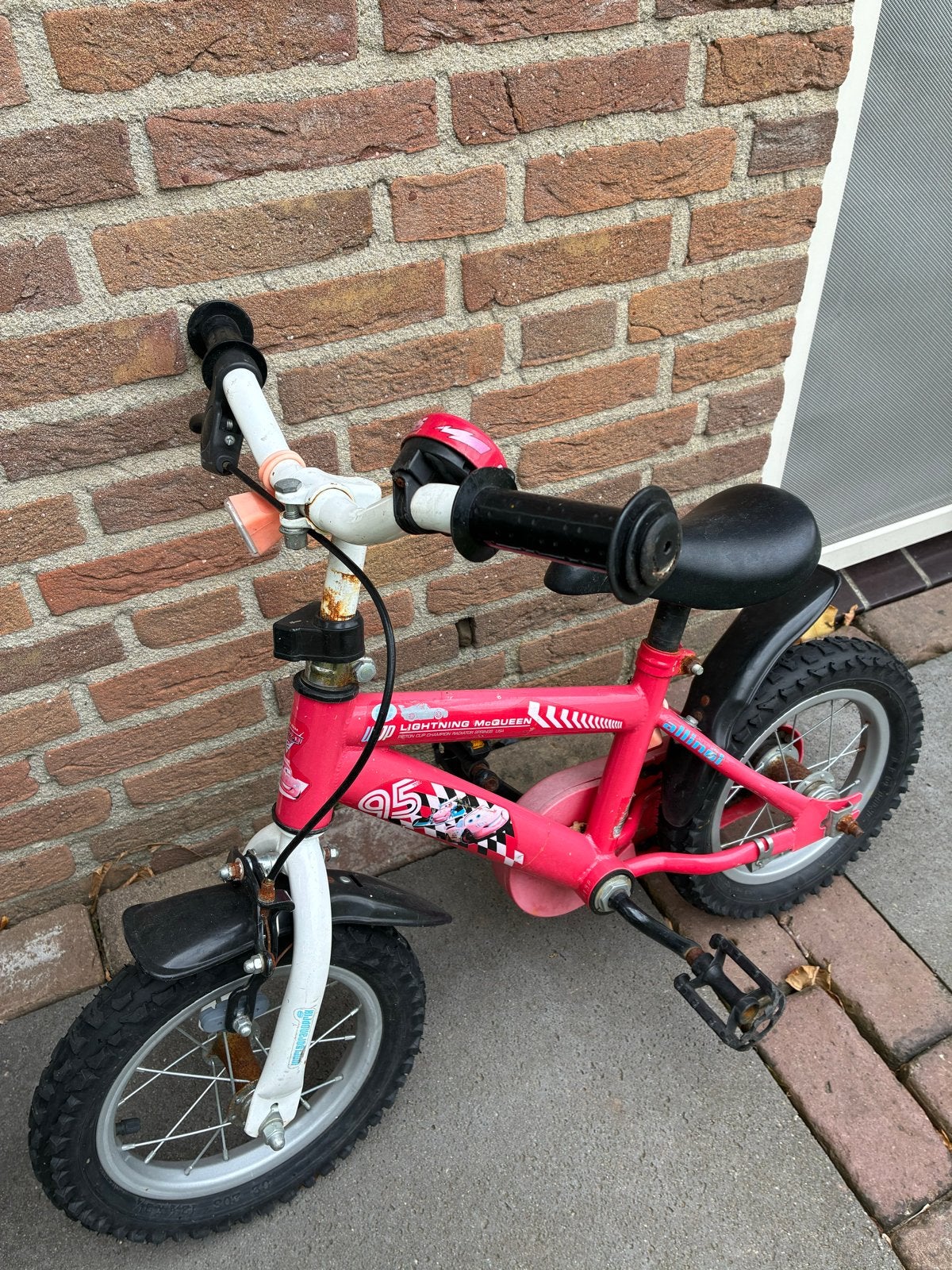 Roze kinderfiets Lightning McQueen 12 inch, Ophalen, Gebruikt, Velgrem, Minder dan 16 inch