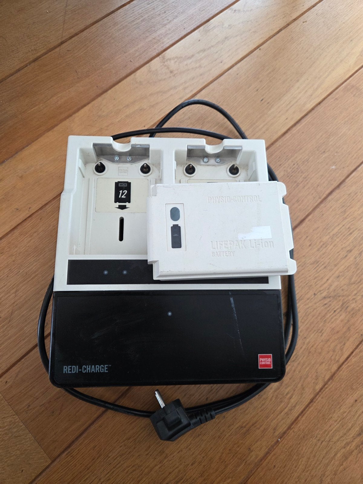 Originele Lifepak 12 battery en oplader, Gebruikt, ., Ophalen of Verzenden, .