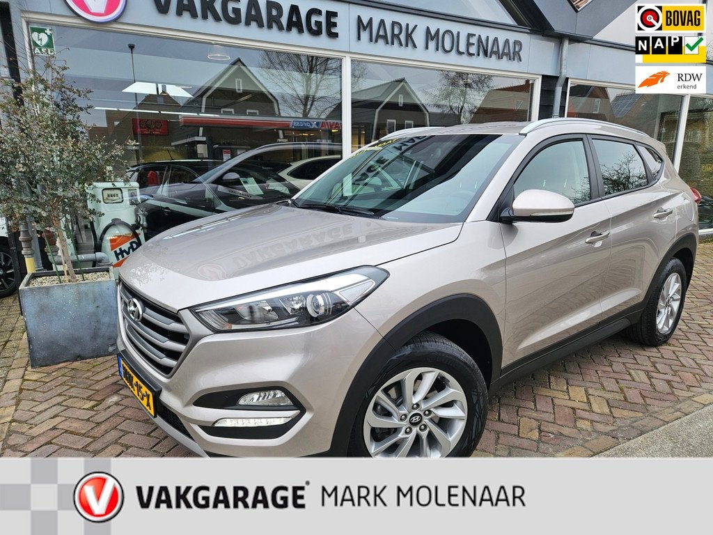 Hyundai TUCSON 1.6 T-GDi i-Motion 4WD,full optionsautomaat, Auto's, Hyundai, Gebruikt, 4 cilinders, Bruin, Bedrijf