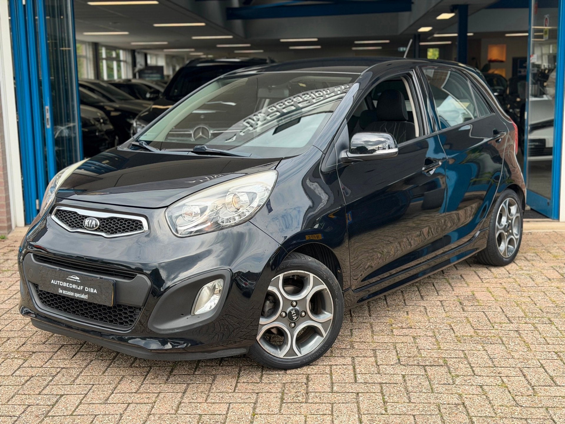 Kia Picanto 1.2 CVVT ISG Plus Pack 2015 cruise airco nap, Auto's, Voorwielaandrijving, Gebruikt, Zwart, 4 cilinders