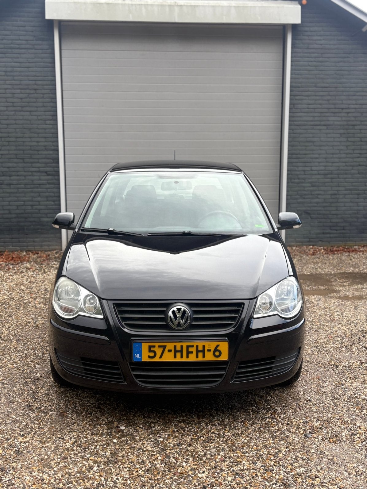 Volkswagen Polo 1.2 51KW 2008 Zwart, Voorwielaandrijving, Stof, 40 €/maand, Metallic lak