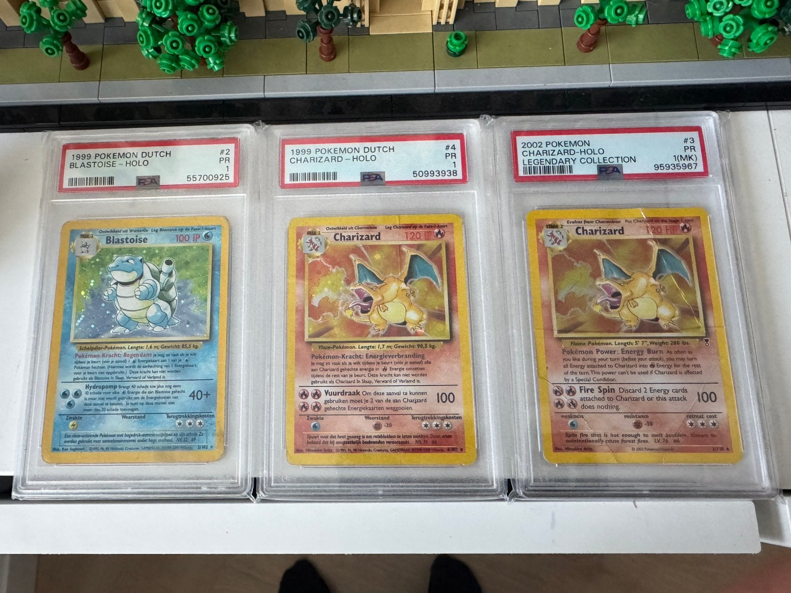 PSA 1 Charizard en Blastoise, Ophalen, Zo goed als nieuw