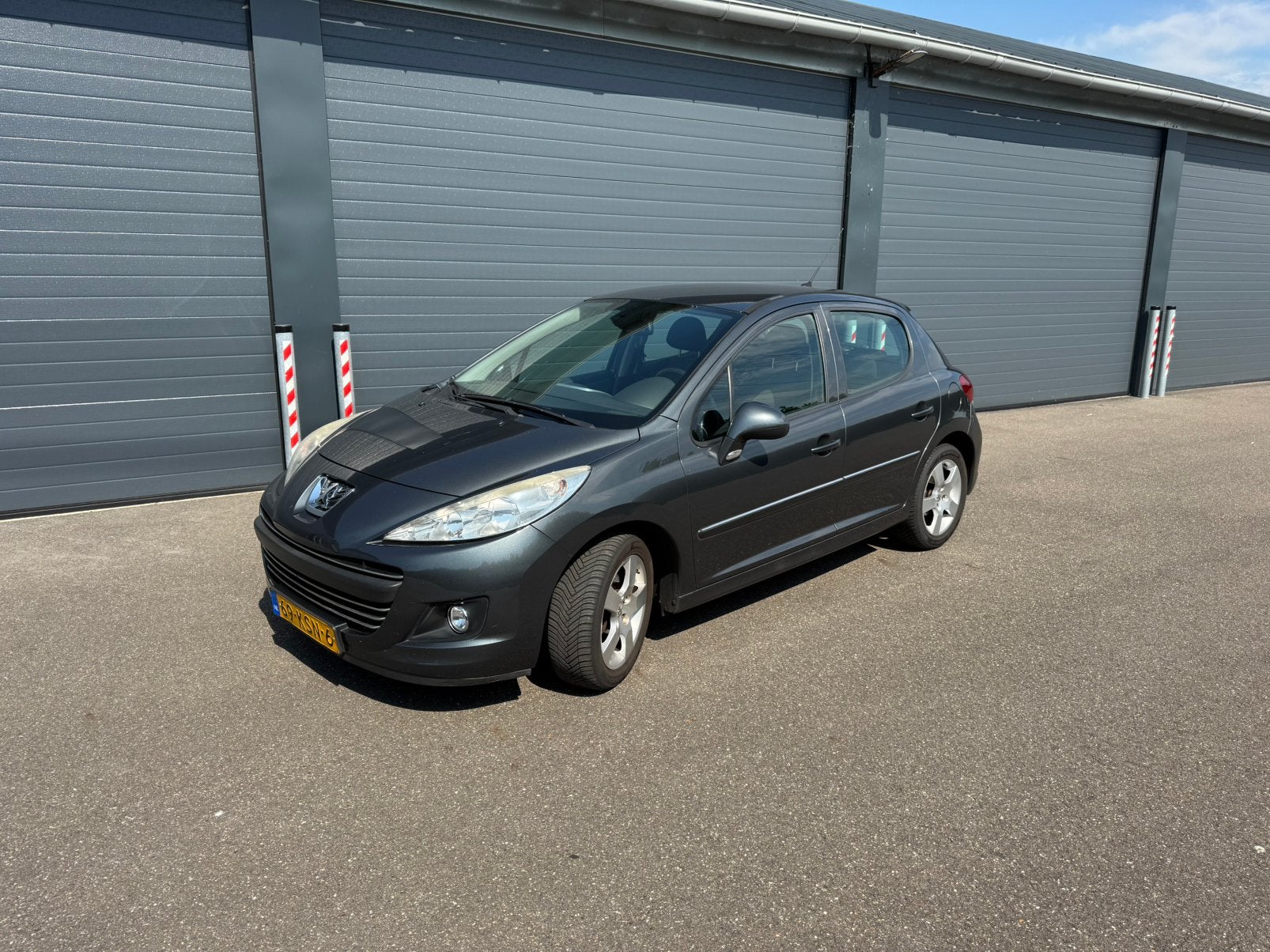 Peugeot 207 1.6 VTI 16V 5DRS 2010 Grijs, Auto's, Voorwielaandrijving, Dealer onderhouden, Stof, Zwart