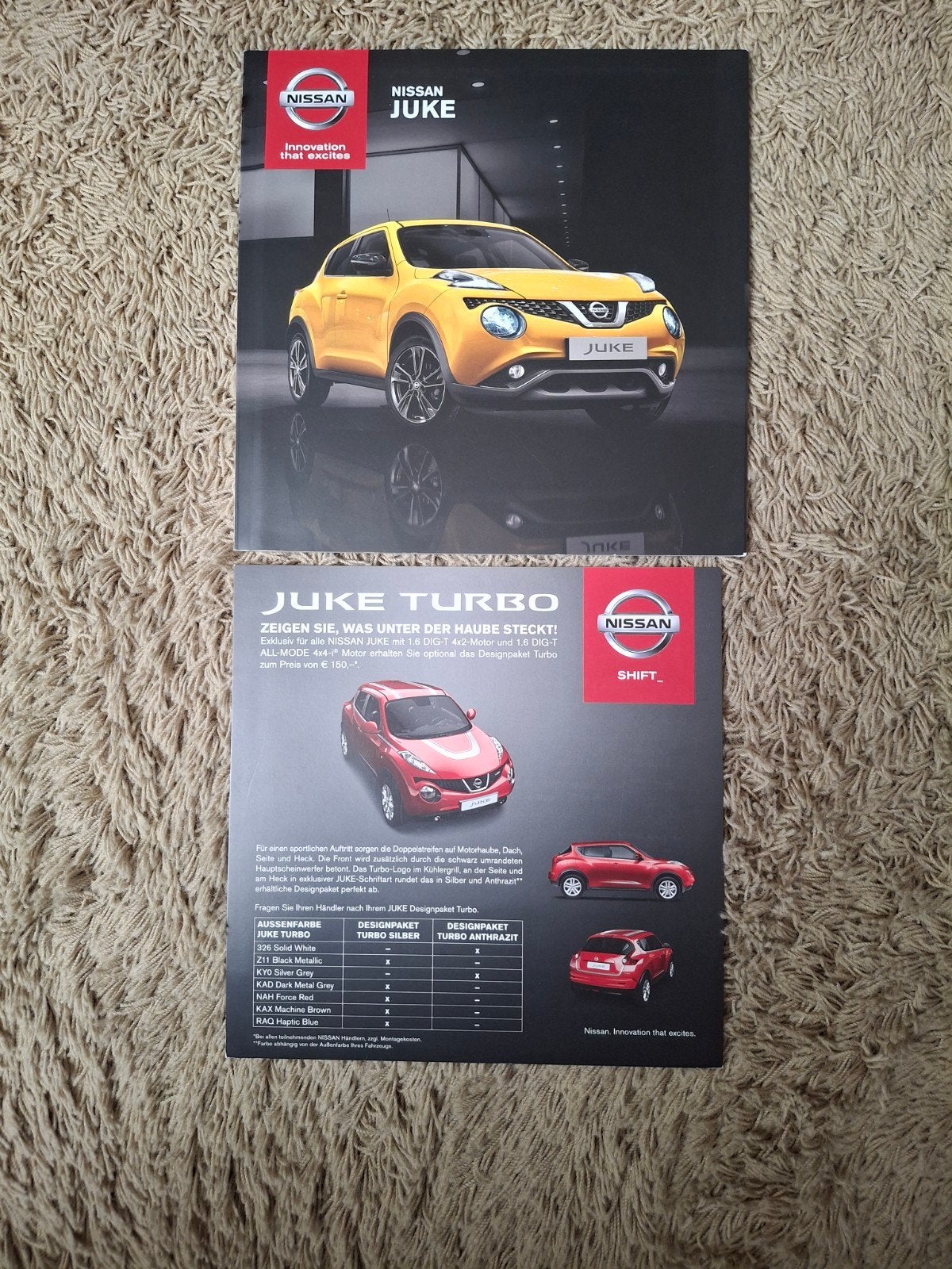 2x autofolder Nissan Juke, Verzenden, Zo goed als nieuw, Nissan