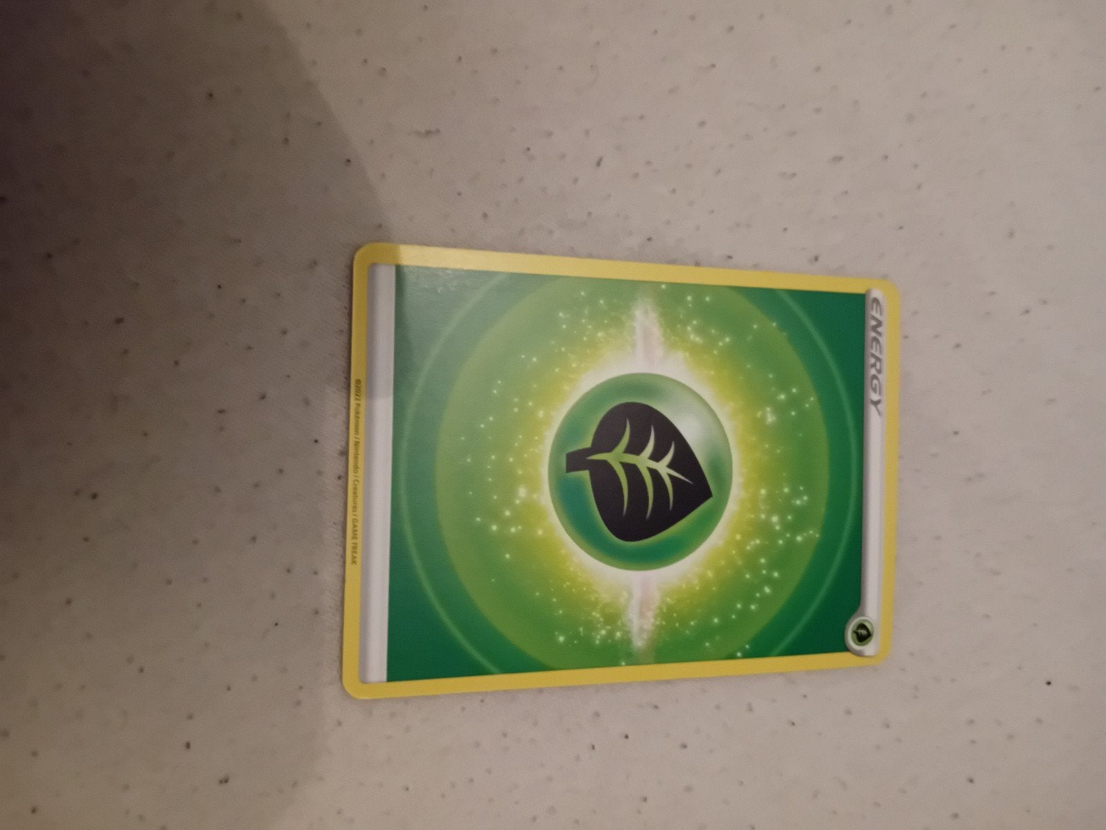 Pokémon TCG Gras Energiekaart, Ophalen of Verzenden, Zo goed als nieuw, Losse kaart, Foil