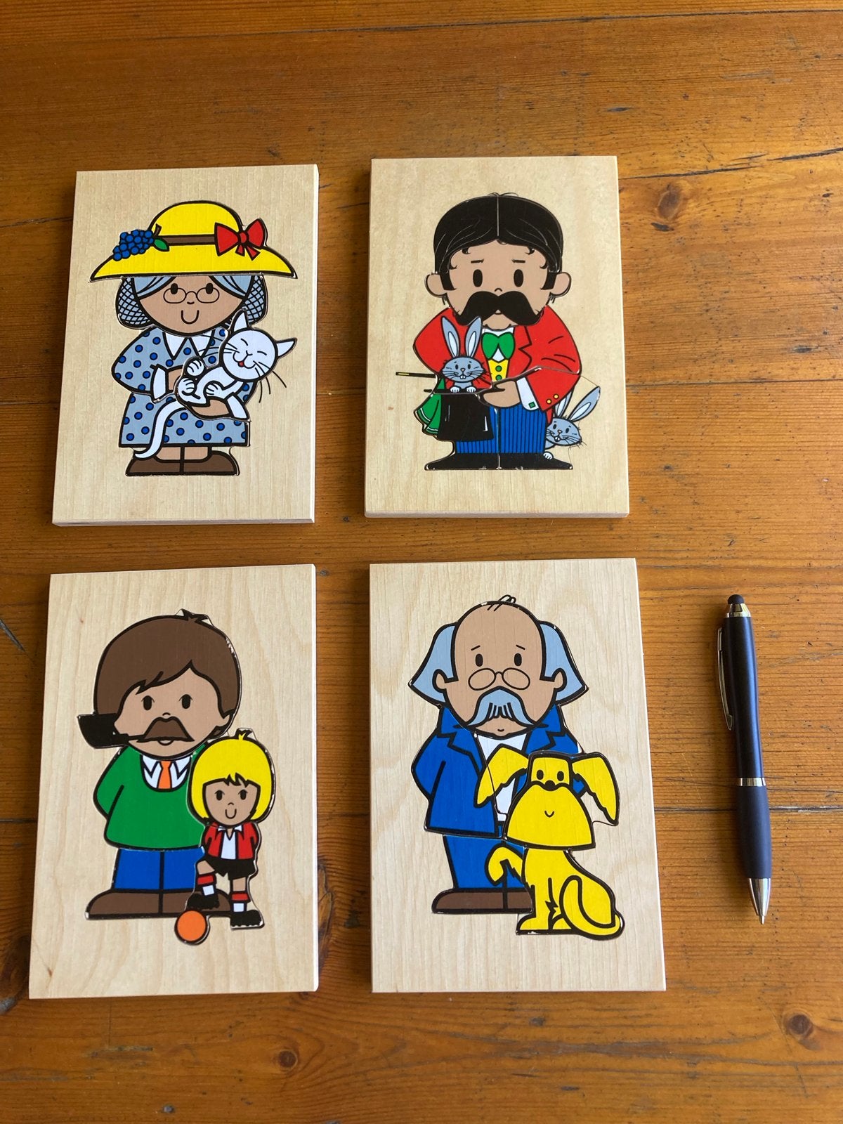 Rolf houten puzzels - 4 stuks, 2 tot 4 jaar, Gebruikt, Ophalen of Verzenden, Van hout