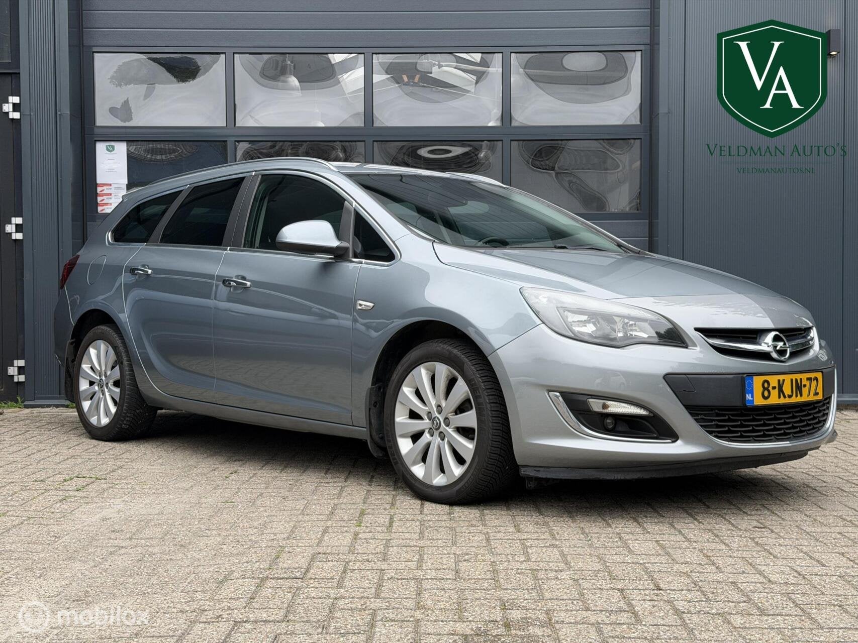 Opel Astra Sports Tourer 1.4 Turbo | Airco | Cruise | Navi, Voorwielaandrijving, Euro 5, Gebruikt, 4 cilinders