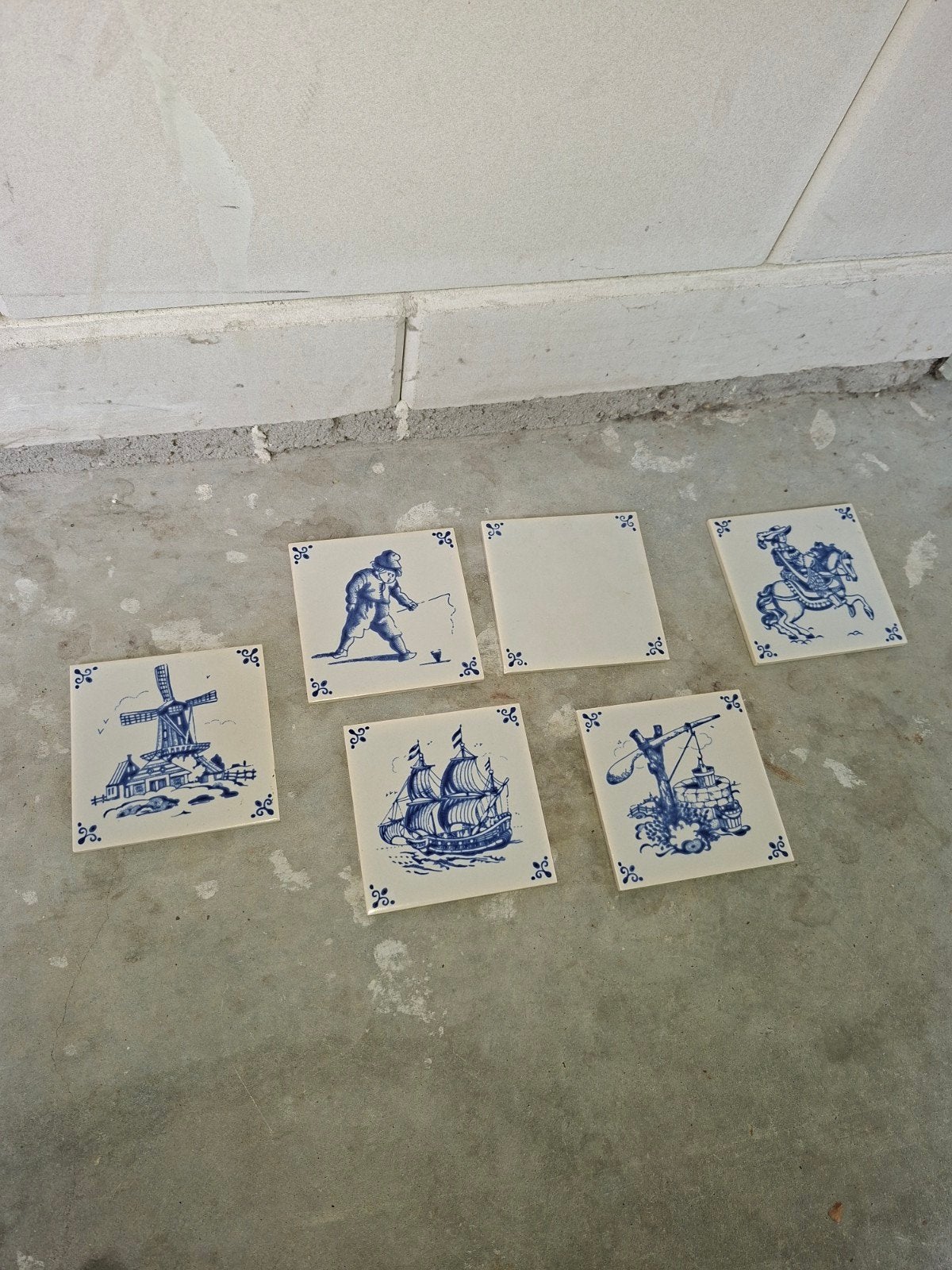 Set van 6 Delfts Blauwe tegels met Hollandse taferelen, Antiek en Kunst, Ophalen of Verzenden