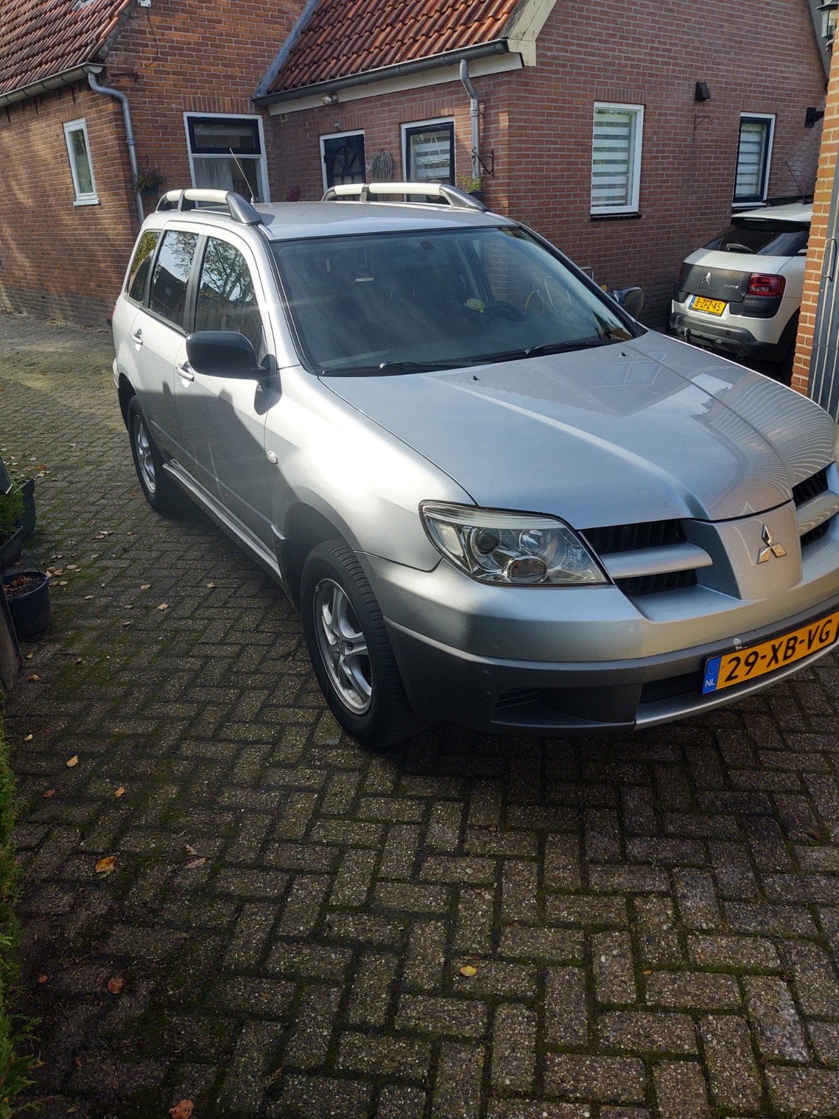 Mitsubishi Outlander 2.0 MPI 2WD 2007 Grijs 14 maand apk, Auto's, Voorwielaandrijving, Outlander, Zwart, 4 cilinders