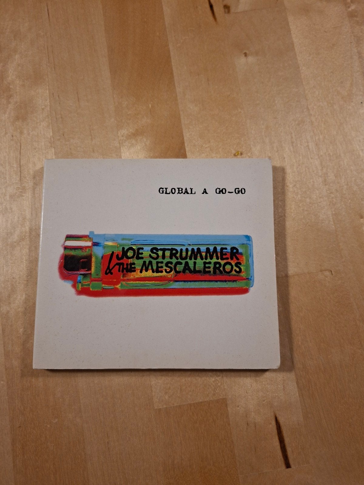 JOE STRUMMER &THE MESCALEROS global a go-go, Ophalen of Verzenden, Zo goed als nieuw, Poprock