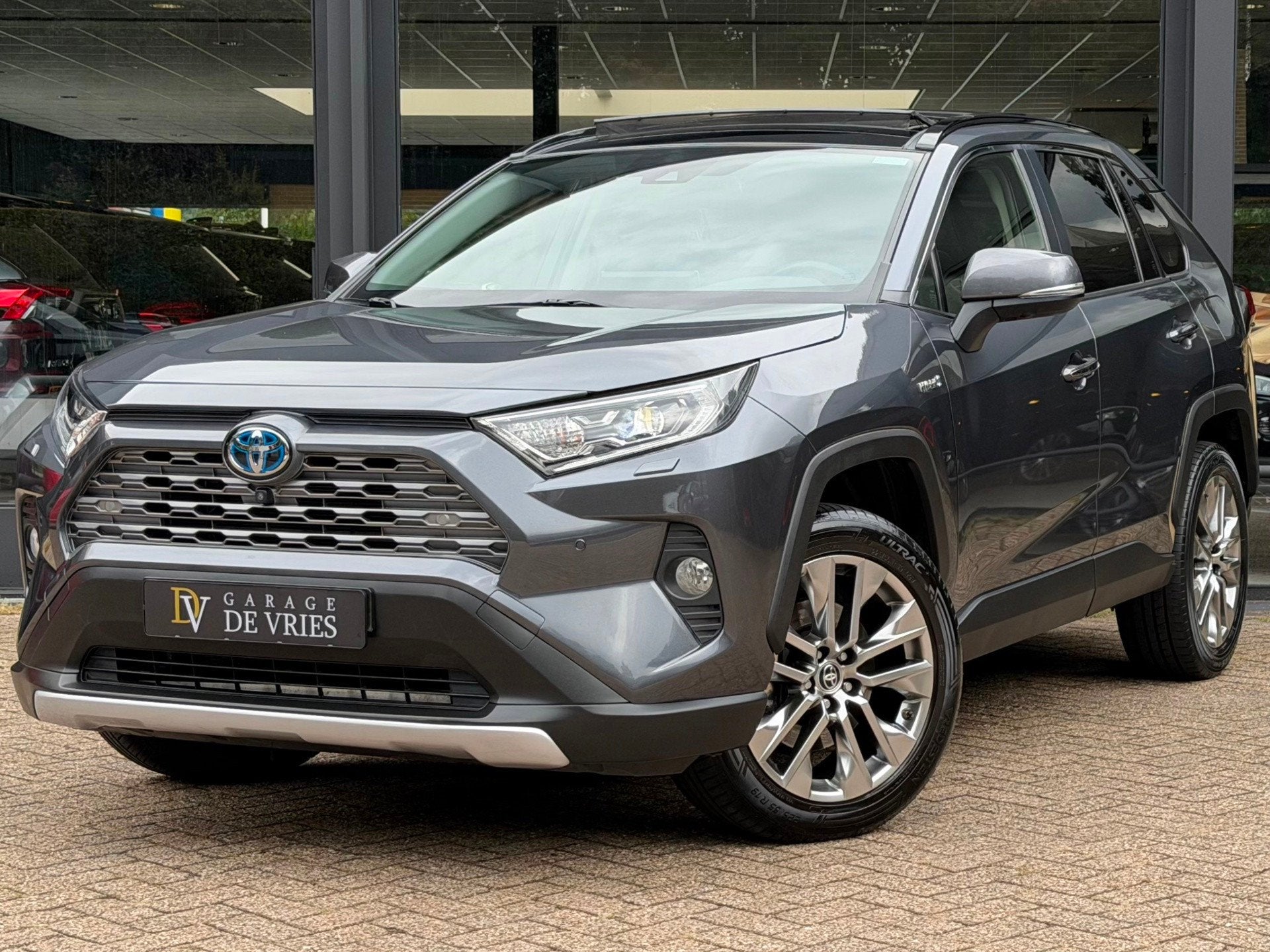 Toyota RAV4 2.5 Hybrid Executive Panoramadak Full Option ACC, Dealer onderhouden, Gebruikt, Zwart, 4 cilinders