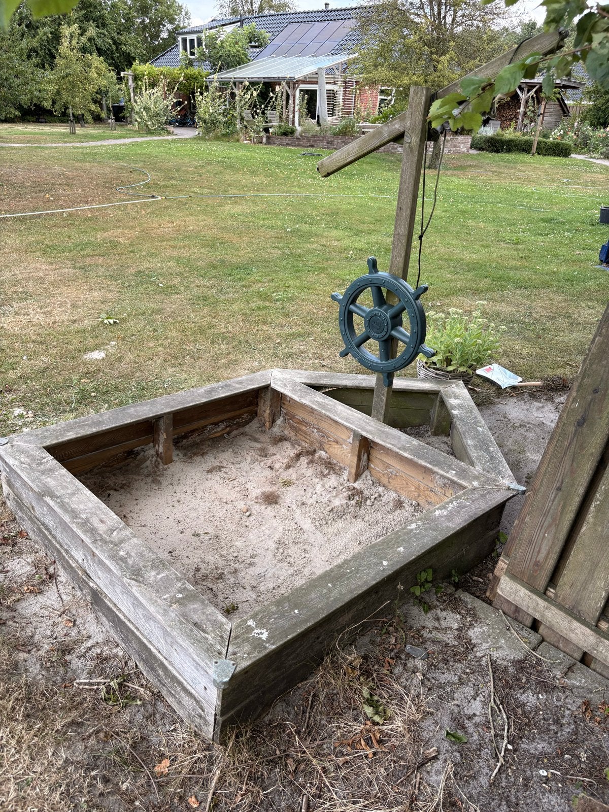 Houten zandbak met stuurwiel, Ophalen, Gebruikt