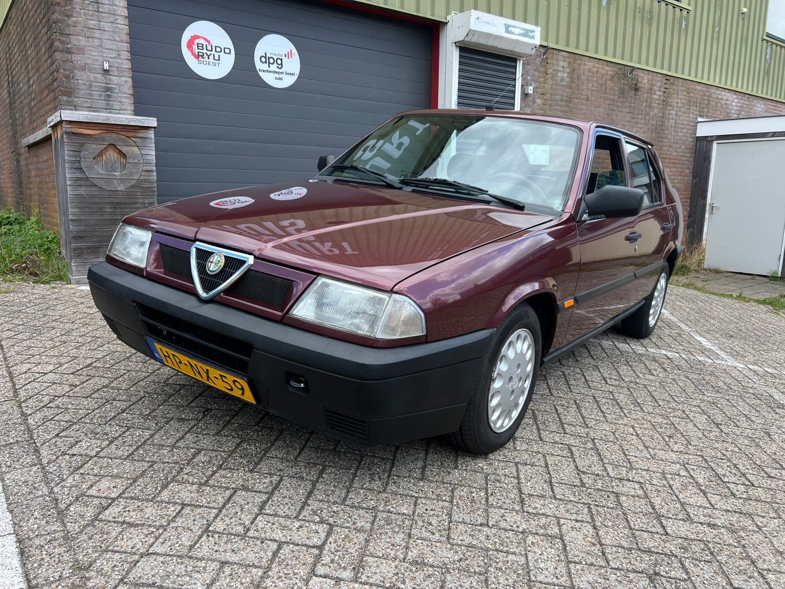 Alfa Romeo 33 1.4 IEL 1994 Rood APK 139dKm, Auto's, Alfa Romeo, Voorwielaandrijving, Stof, Origineel Nederlands, Bedrijf