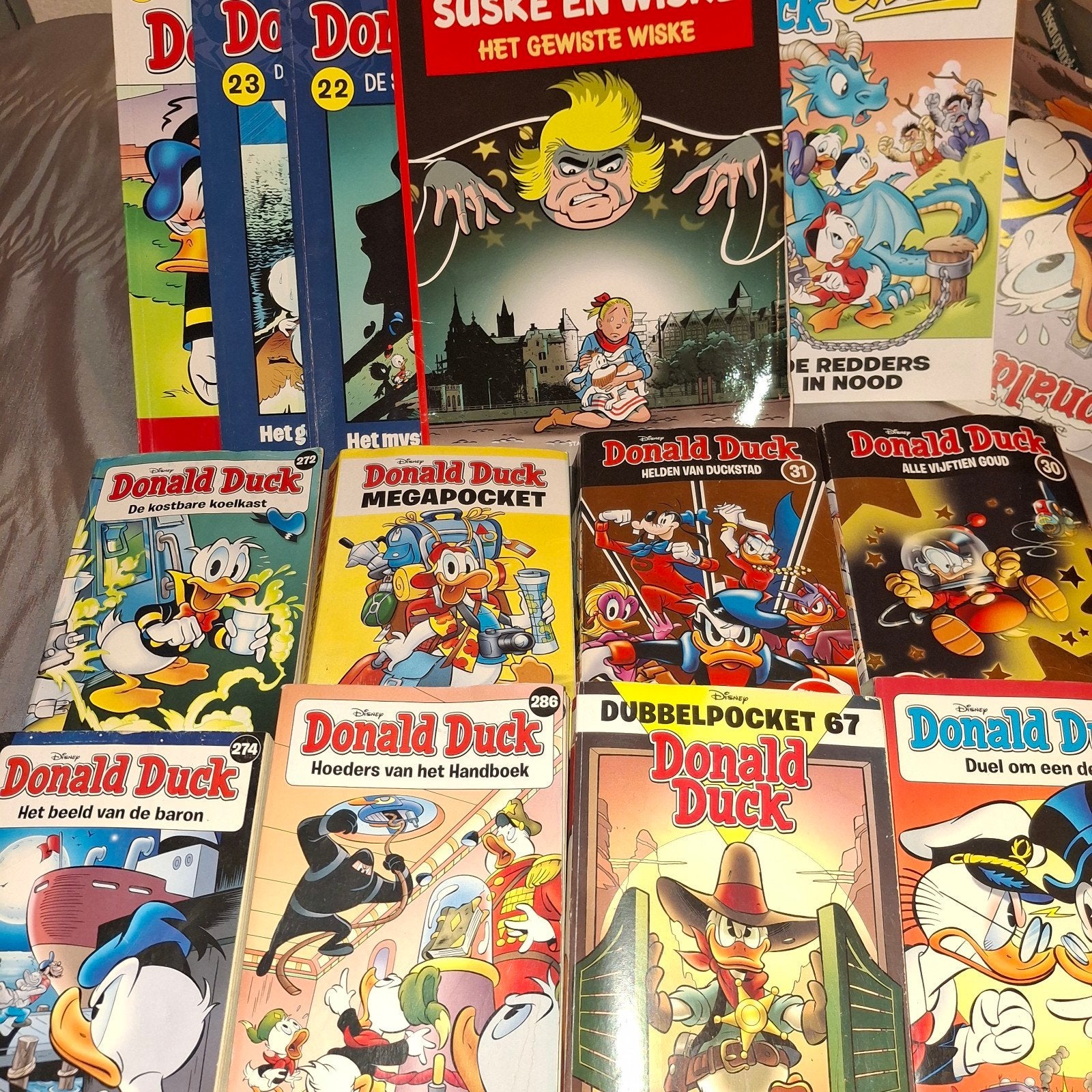 Donald Duck Pocket en gewone stripboeken, Meerdere stripboeken, Ophalen of Verzenden, Gelezen