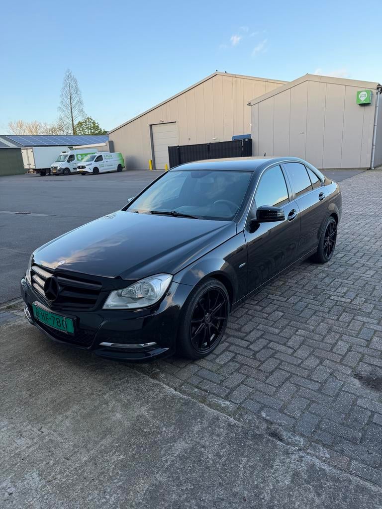 Mercedes-Benz C-Klasse 1.8 C180 CGI Sedan 2011 Zwart, Auto's, Mercedes-Benz, Voorwielaandrijving, 1800 kg, 1796 cc, Zwart