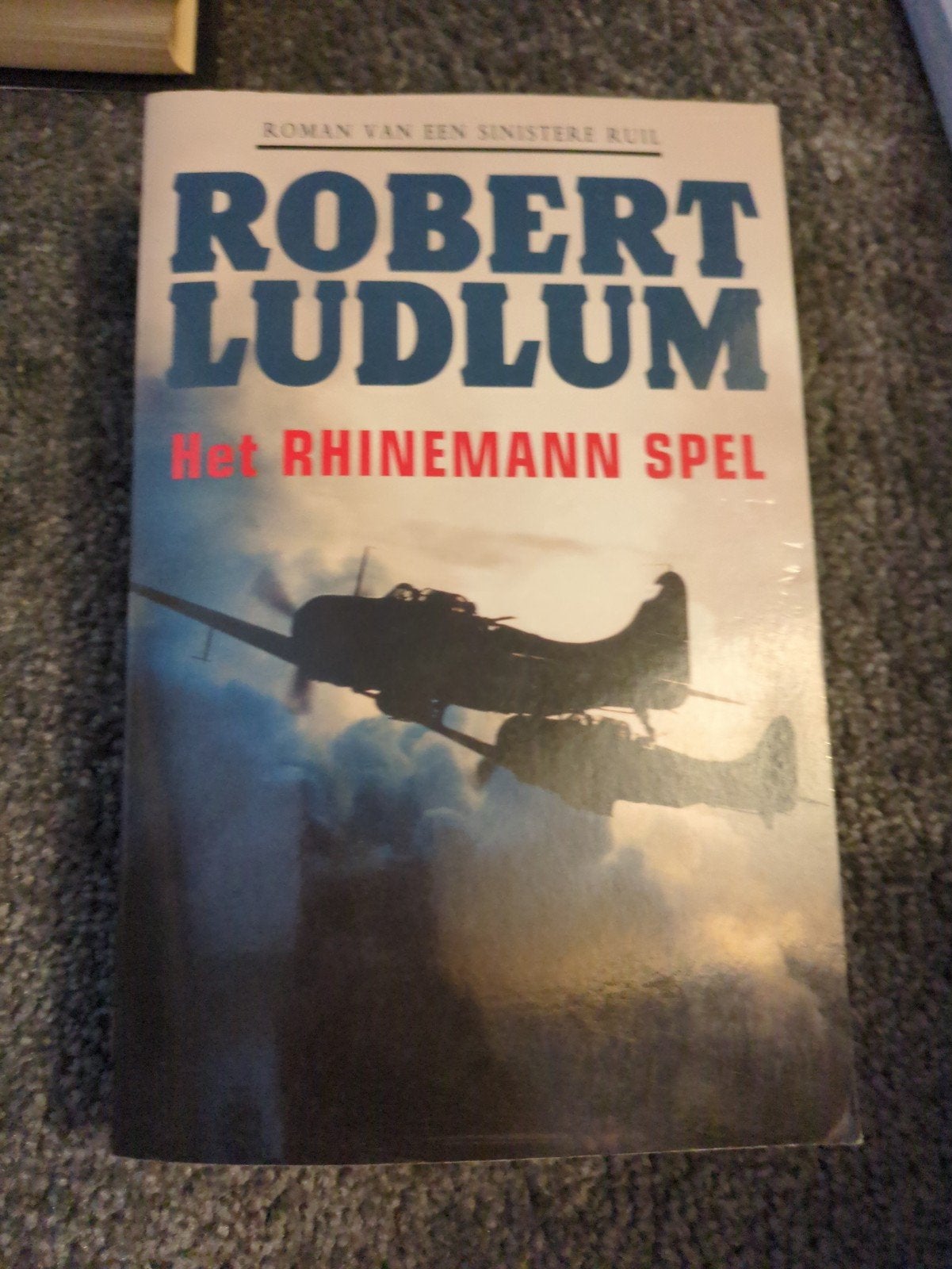 Robert Ludlum - Het Rhinemann Spel, Ophalen of Verzenden, Gelezen, Robert Ludlum, Europa overig