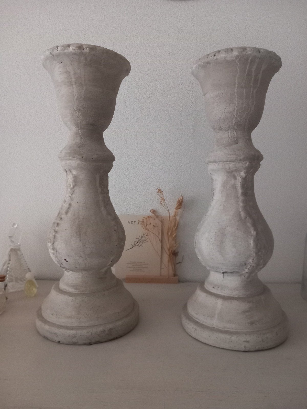 2 betonnen kandelaars/consoles, Ophalen