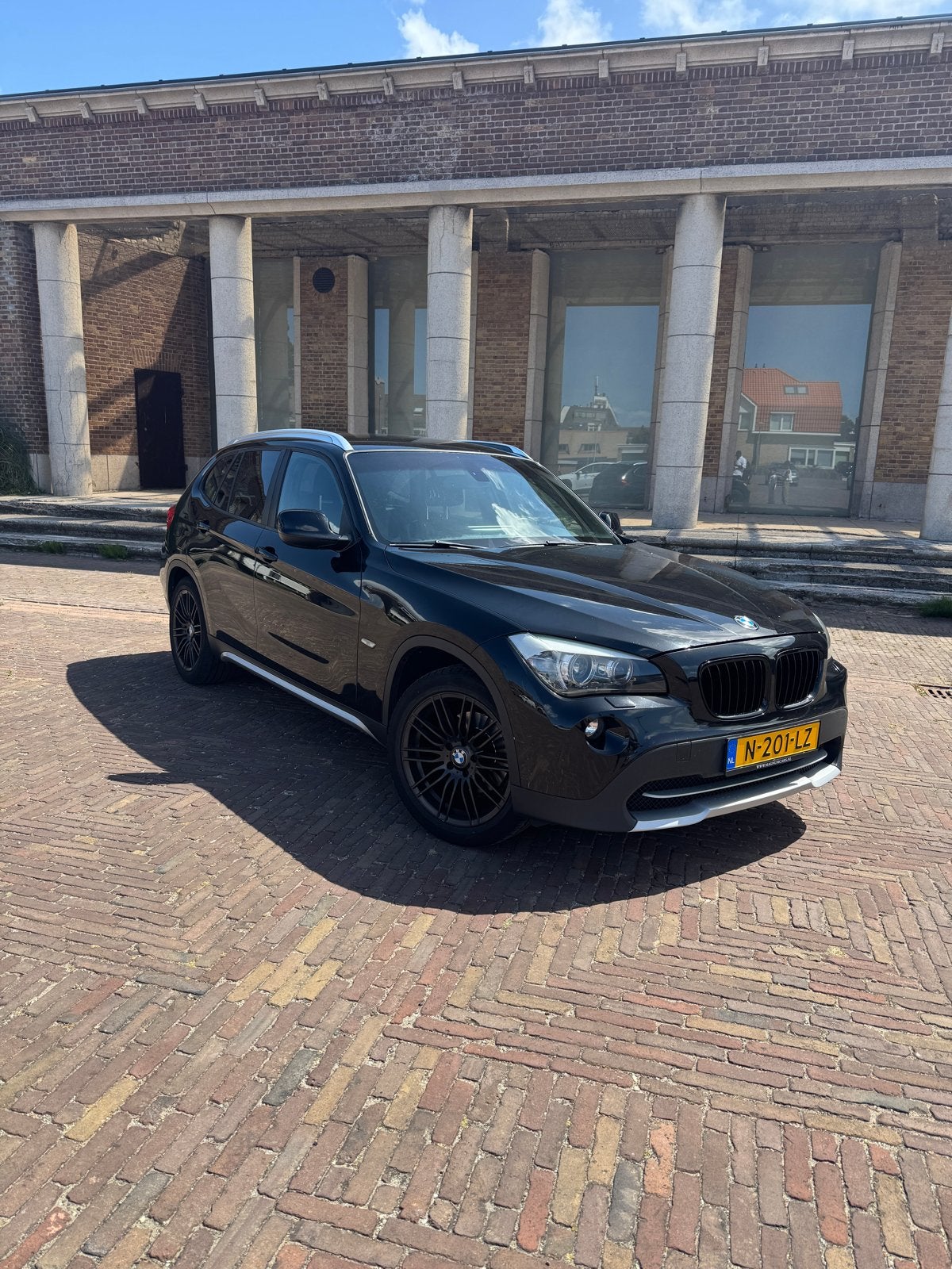 BMW X1 Sdrive 18I AUT 2010 Zwart, Auto's, 1995 cc, Zwart, 4 cilinders, Automatische klimaatregeling