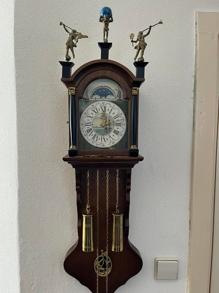 Wand Klok, Ophalen