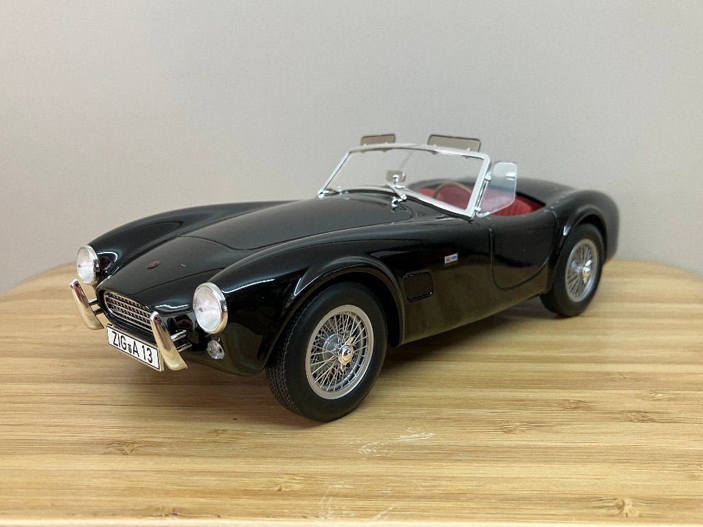 AC  Cobra 289 van 1963  zwart  1/18 Norev, Ophalen of Verzenden, Nieuw, Auto, Norev