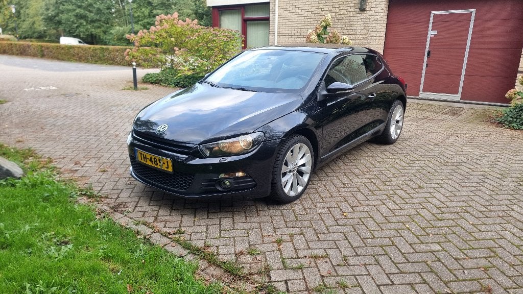 Volkswagen Scirocco 1.4 TSI 90KW Comfortline BMT 2010 Zwart, Auto's, Voorwielaandrijving, Zwart, 4 cilinders, 4 stoelen