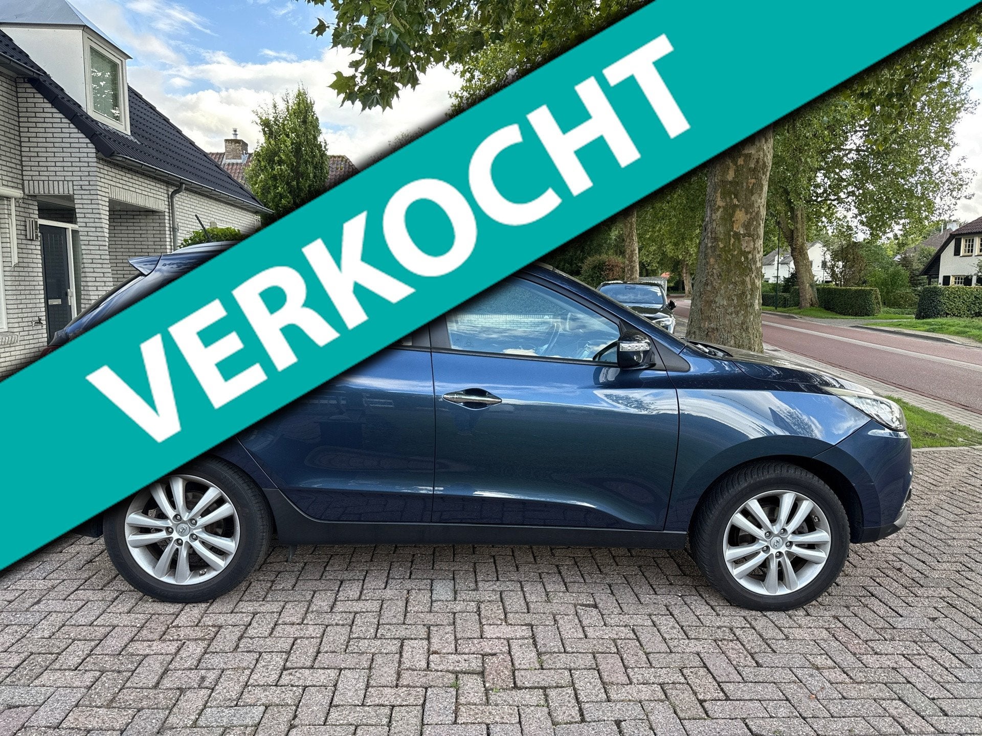 Hyundai Ix35 2.0i 4WD Active automaat, Auto's, Automaat, Gebruikt, Zwart, 4 cilinders