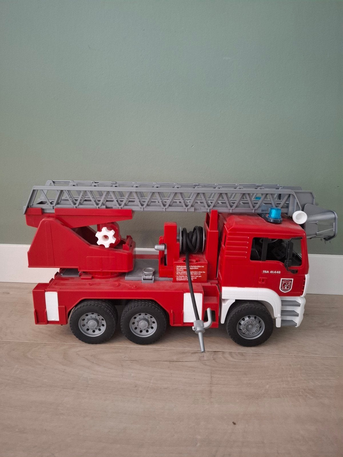 Bruder brandweerwagen, Ophalen, Gebruikt