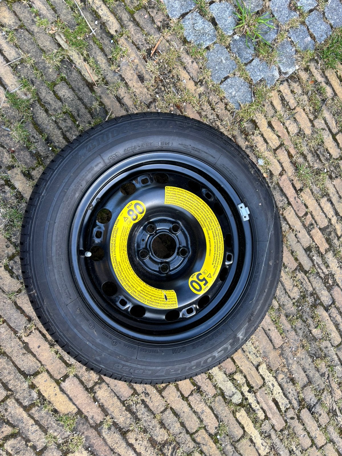 Thuiskomer reservewiel VW polo 15 inch, Ophalen, Zo goed als nieuw