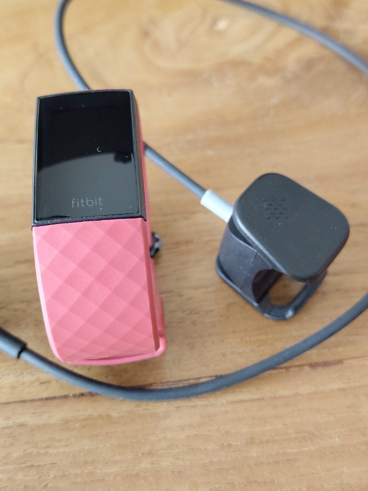 Fitbit Charge 4 Activity Tracker - Koraalrood, Ophalen of Verzenden, Zo goed als nieuw, Fitbit, Waterdicht