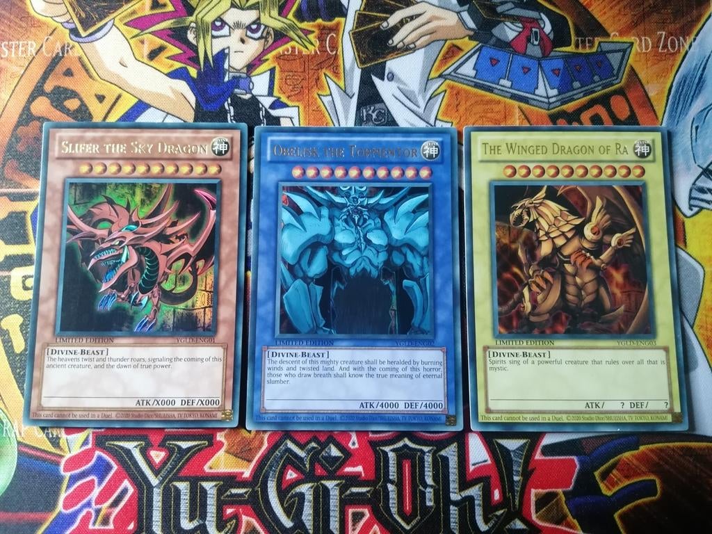 Egyptian God Set - Ultra Rare YGLD - Yu-Gi-Oh, Ophalen of Verzenden, Zo goed als nieuw, Meerdere kaarten, Foil