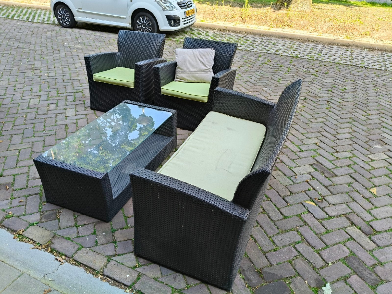 Loungeset hard kunststof met tafel en kussens, 4 zitplaatsen, Kunststof, Gebruikt, Ophalen of Verzenden