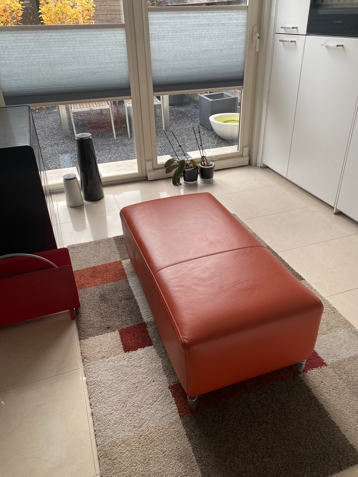 Leolux Faya Lobi lederen poef / hocker,, Ophalen, Eenpersoons, 75 tot 100 cm, Zo goed als nieuw