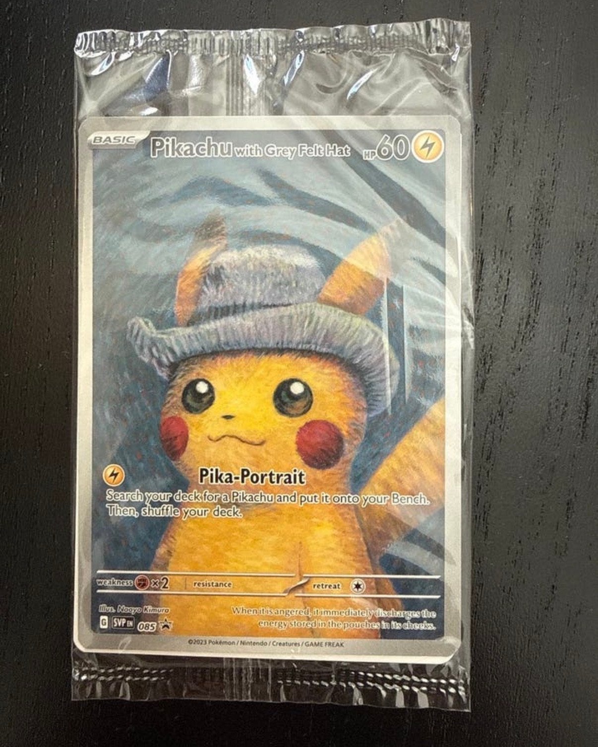 Pikachu met Grijze Vilten Hoed (Van Gogh) Pokémon Kaart Ongr, Ophalen of Verzenden, Zo goed als nieuw, Losse kaart