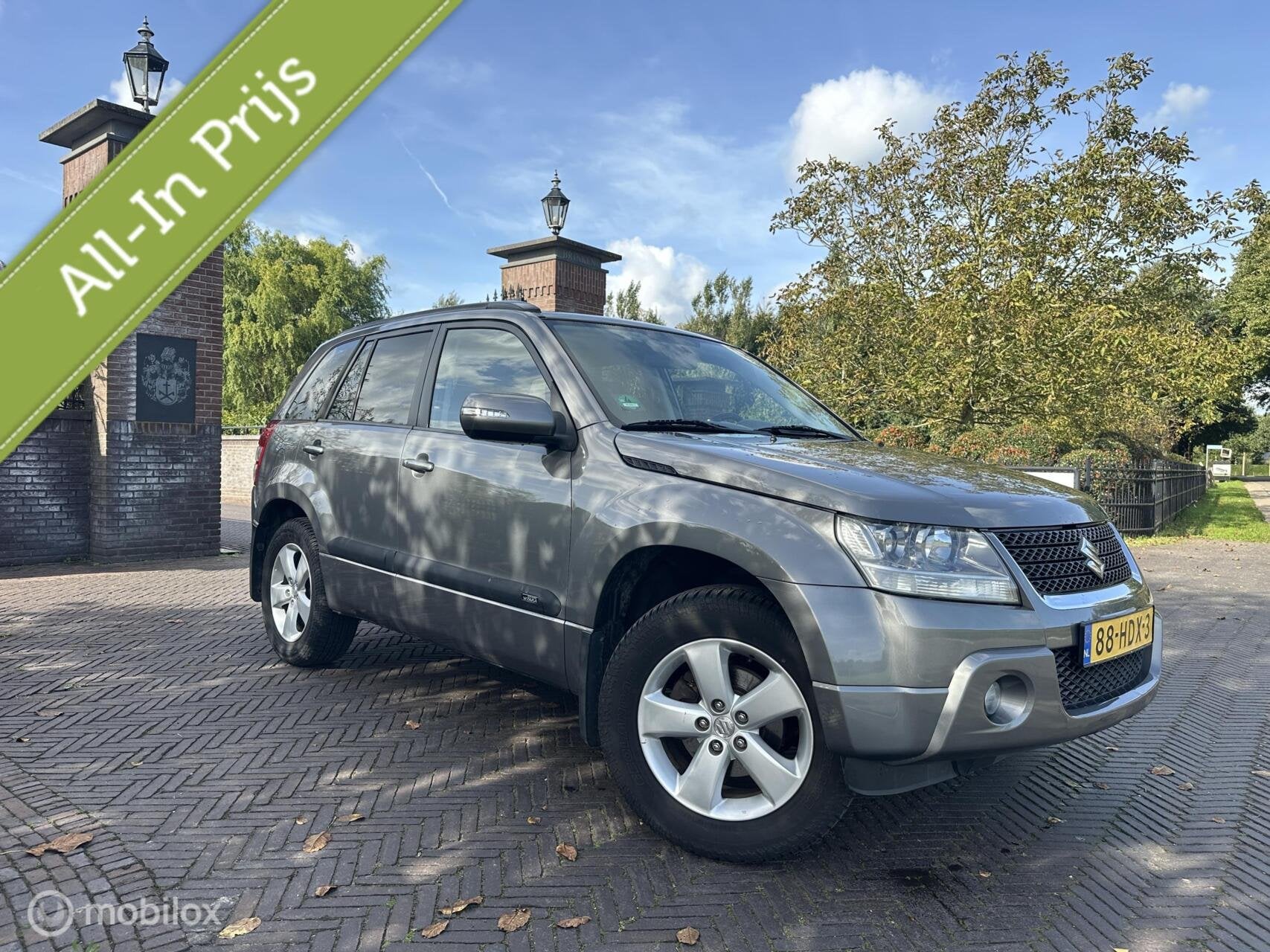 Suzuki Grand Vitara 2.4 Exclusive 4x4 Trekhaak Cruise✅, Stof, Gebruikt, Zwart, 4 cilinders