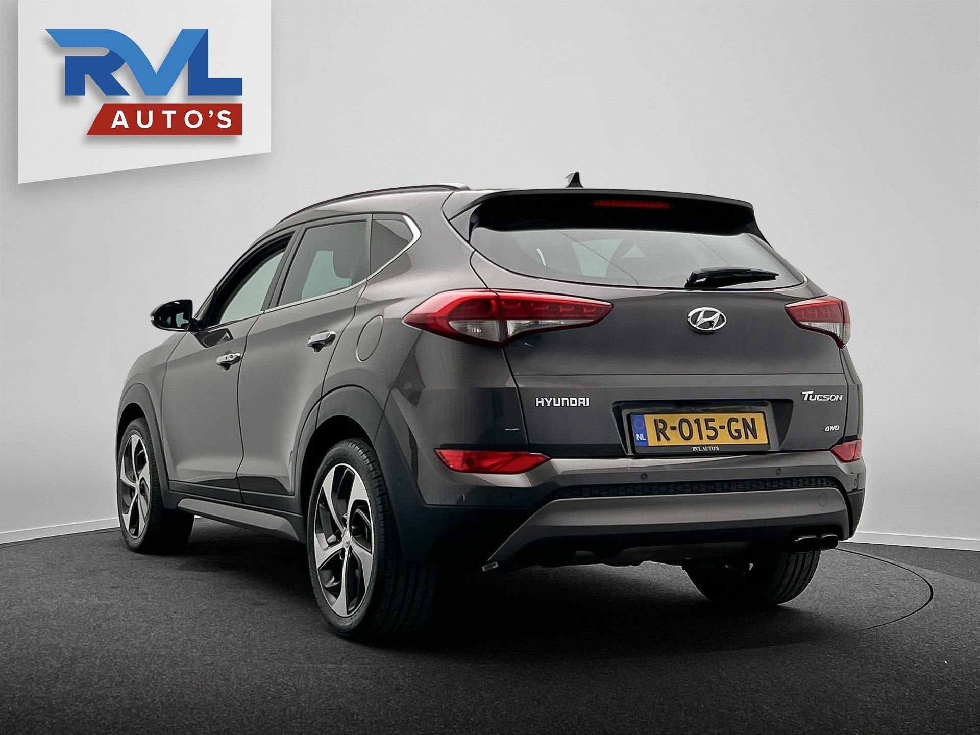 Hyundai Tucson 1.6 T-GDi Premium 4WD | Lane-Assist | Camera, Auto's, Gebruikt, 4 cilinders, Bruin, Leder
