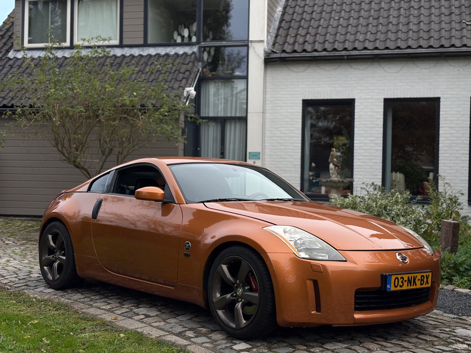 Nissan 350Z 3.5 V6 24V - Le mans sunset orange / Invidia, Auto's, 350Z, Achterwielaandrijving, Android Auto, Zwart
