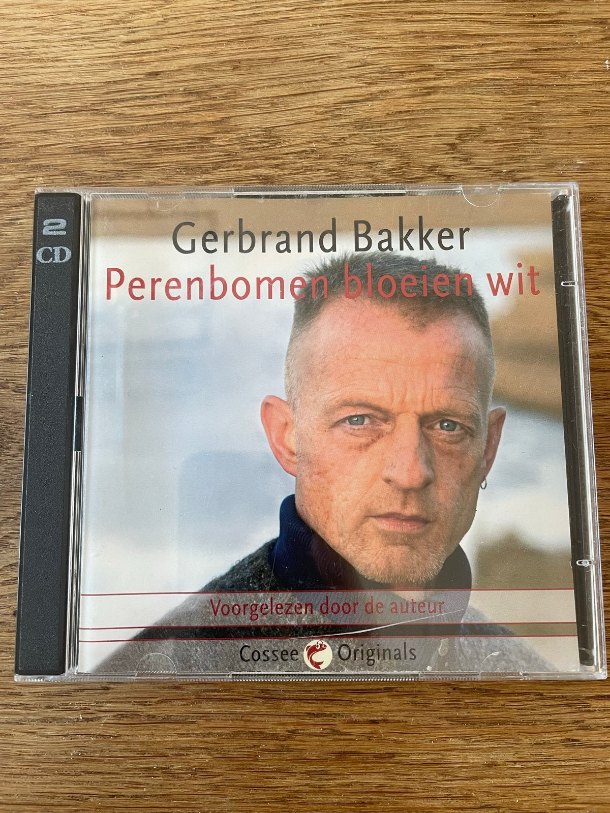 Luisterboek: Perenbomen bloeien wit - Gerbrand Bakker, Ophalen of Verzenden, Cd, Volwassene