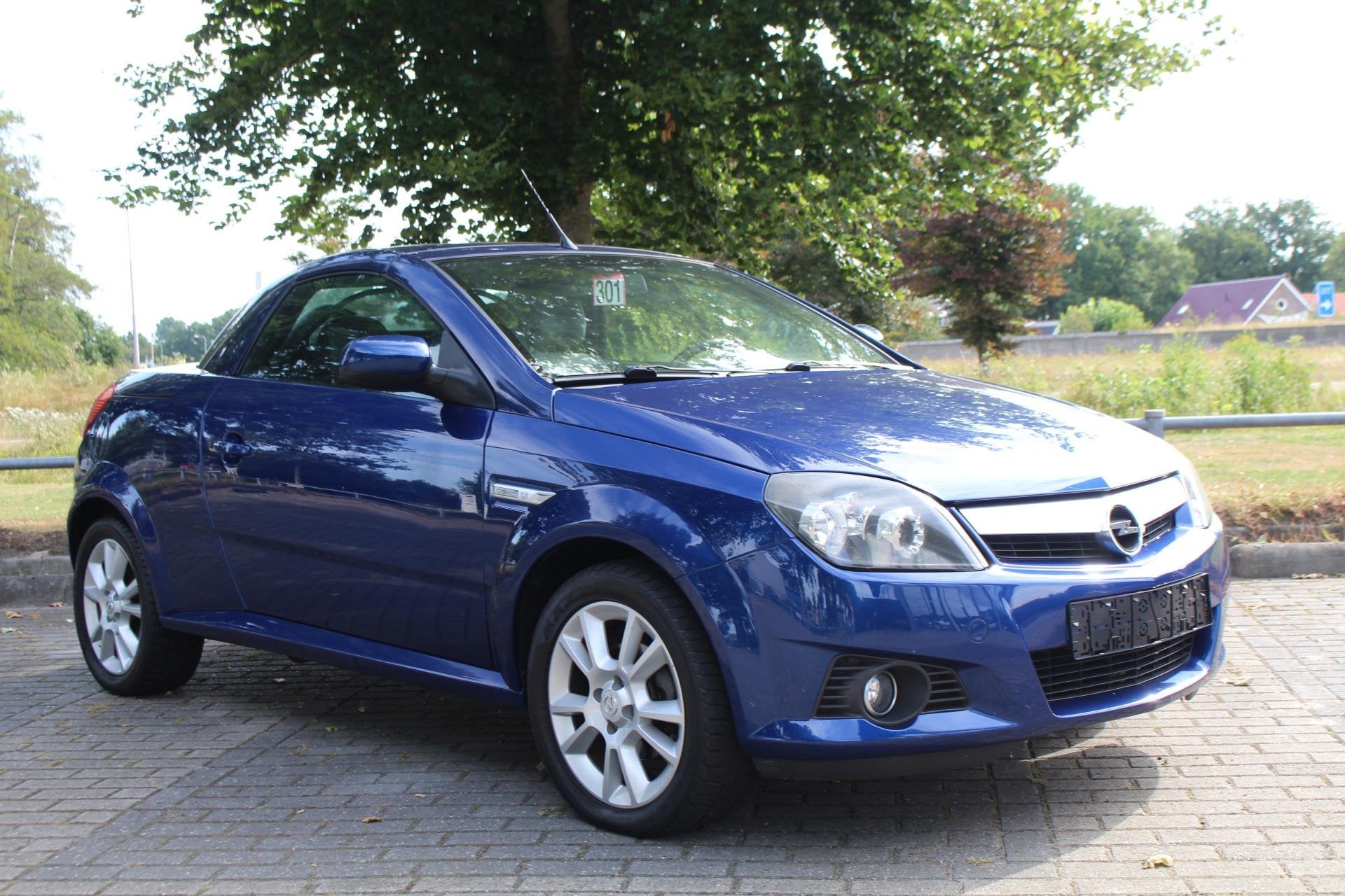 Opel Tigra 1.8 Roadster PRACHTIGE AUTO!, Auto's, Opel, 4 cilinders, Cabriolet, Blauw, Bedrijf