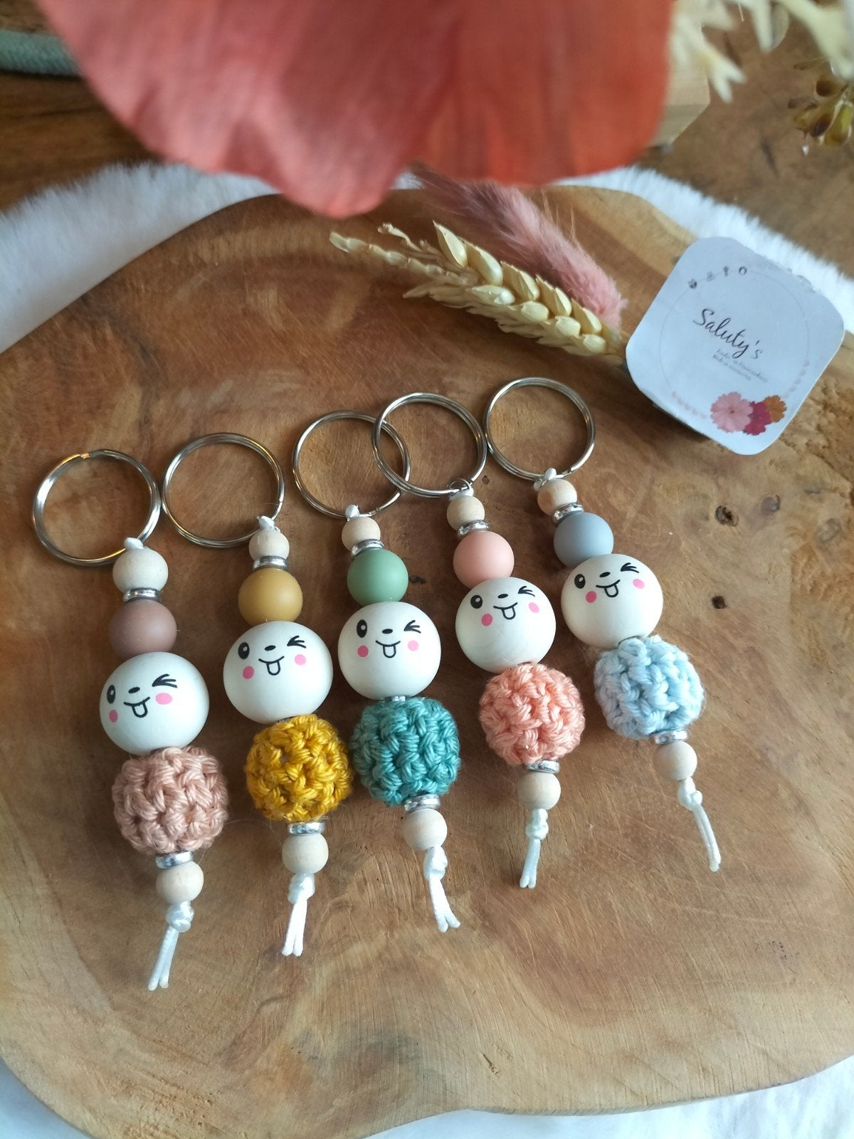 Nieuw • Gelukspoppetje sleutelhanger • Kleurenmix, Salutys kinder- en kraamcadeaus, Nieuw, Ophalen of Verzenden, Infoi