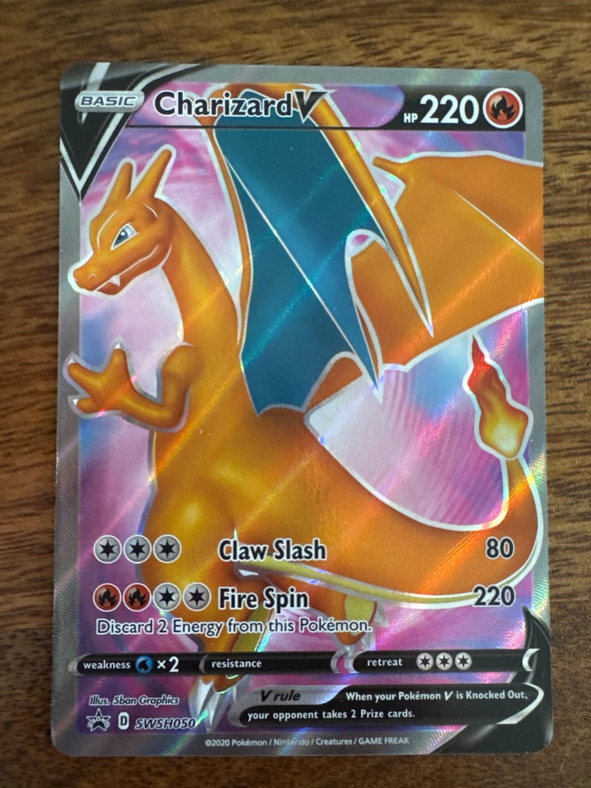 Pokémon Kaart Charizard V SWSH050 Promo - Zo goed als nieuw, Hobby en Vrije tijd, Verzamelkaartspellen | Pokémon, Ophalen, Zo goed als nieuw