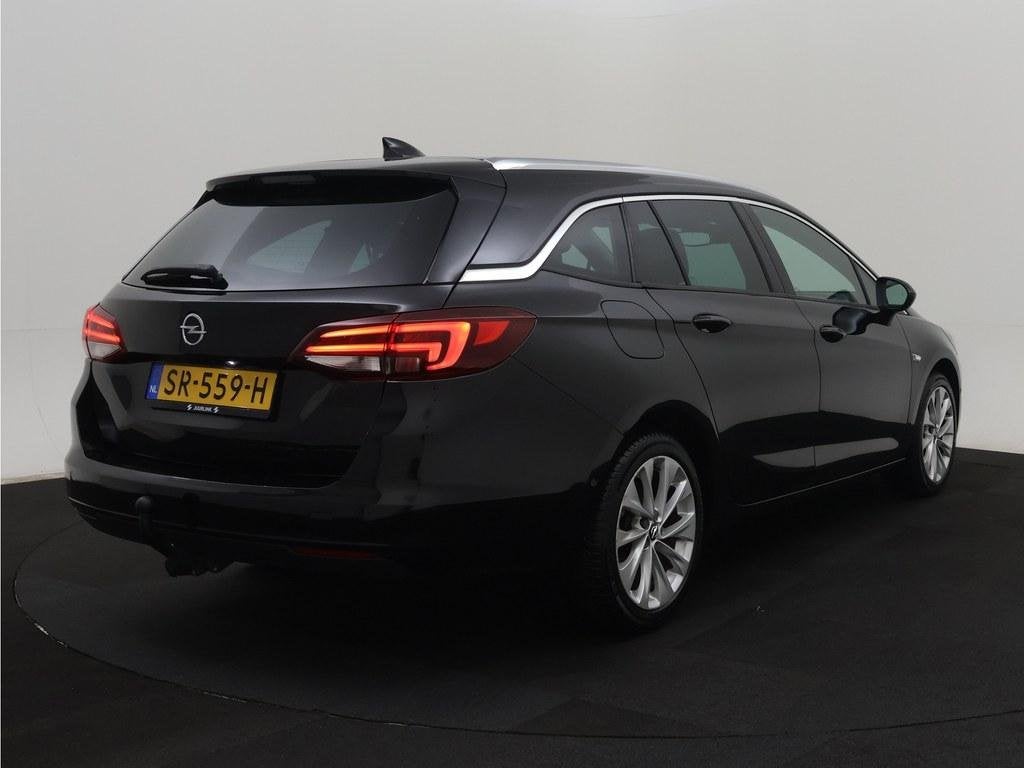 Opel Astra Sports Tourer 1.4 Business Executive Cam/Trekhaak, Auto's, Voorwielaandrijving, Dealer onderhouden, Gebruikt, 4 cilinders